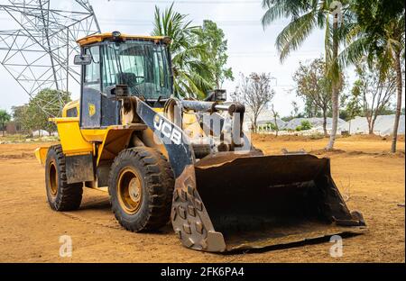 Le JCB 432 ZX est une chargeuse sur pneus très populaire capable de gérer les situations de creusement et de vidage les plus difficiles. Banque D'Images