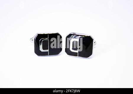 Argent cuff links on white background, Close up . Paire de boutons de manchette, boutons de manchette en acier inoxydable Banque D'Images