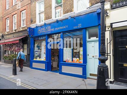 Helios Homeopathic, une pharmacie à New Row, Covent Garden, distribution de médicaments et de traitements homéopathiques, Londres, Angleterre, Royaume-Uni Banque D'Images