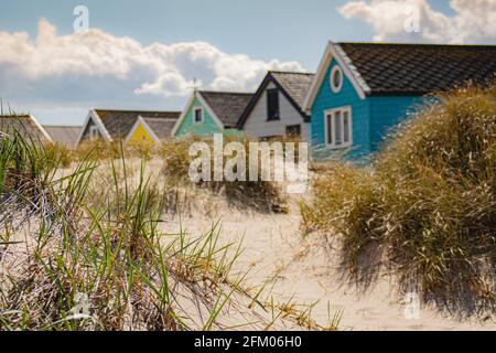 Cabanes de plage à Mudebit sur Hengitsbury Head, Dorset Banque D'Images