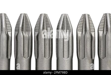 Jeu d'embouts pour les vis. Sélection de formes et d'embouts remplaçables pour un tournevis. Vue macro des outils. Banque D'Images