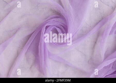 Texture du tissu en mousseline de couleur pourpre ou lilas pour arrière-plans Banque D'Images