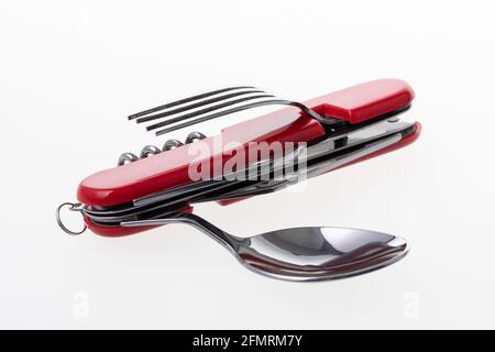L'outil multifonction comprend un couteau, une cuillère, une fourchette, un ouvre-bouteille et un tire-bouchon Banque D'Images
