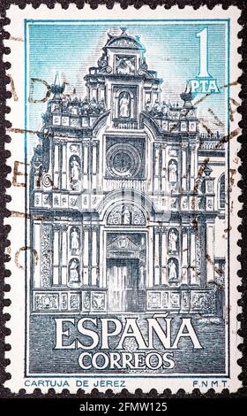 ESPAGNE - VERS 1966: Timbre imprimé par l'Espagne, montre le monastère de Carthusien, Jerez, Portal, vers 1966 Banque D'Images