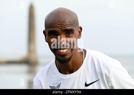 Photo du dossier datée du 12-09-2020 de Sir Mo Farah après avoir traversé la ligne d'arrivée après avoir participé au semi-marathon d'Antrim Coast. Date de publication : le mercredi 12 mai 2021. Banque D'Images