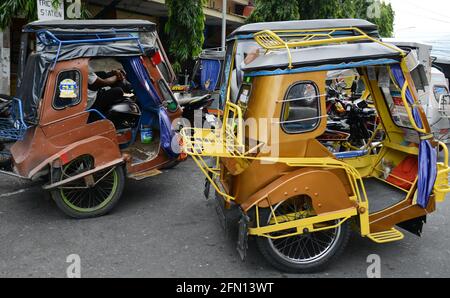 Tricycle motorisé à Sorsogon, Bicol, Philippines. Banque D'Images