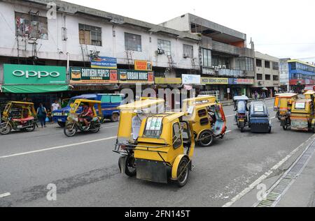 Tricycle motorisé à Sorsogon, Bicol, Philippines. Banque D'Images