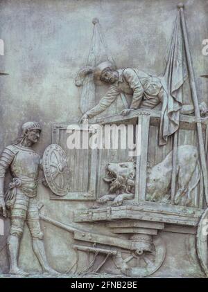 Espagne, Madrid - 6 mars 2021 : relief en bronze avec la scène Don Quichotte. Par Jose Piquer Duart, 1835. Aventure des lions. Miguel de Cervantes monumen Banque D'Images