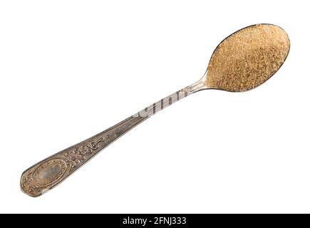 Vue de dessus du sucre granulé de noix de coco dans la découpe de cuillère à café d'argent sur fond blanc Banque D'Images