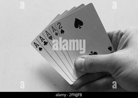 main de poker quatre as noir et blanc Banque D'Images