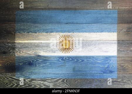 Drapeau argentin sur fond rustique de surface en bois ancien Banque D'Images