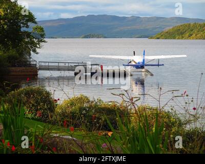 Loch Lomond tours en hydravion Cessna C208A avion amarré Banque D'Images