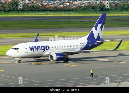 Boeing 737 de Wingo à l'aéroport international El Dorado. B737 avion exploité par Aero Republica. Fait partie de Copa Holdings. Avion de Wingo Airlines. Banque D'Images