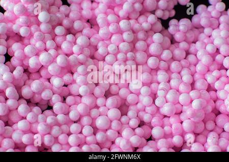 Arrière-plan de petites et grandes boules roses. Photo de haute qualité Banque D'Images