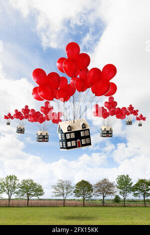 Concept de relocalisation de la maison avec des maisons flottant sur le paysage britannique avec des ballons rouges. Agent immobilier et concept immobilier. Banque D'Images