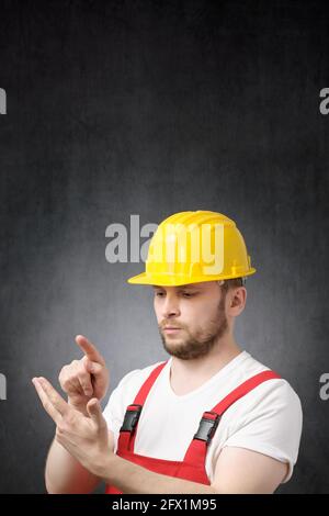 Portrait d'un ouvrier de construction de comptage Banque D'Images
