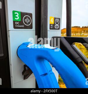 Les types de chargeurs EV dans la station de chargement EV sont mis au point Banque D'Images