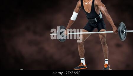 Composition de la basse section de fort soulèvement d'homme afro-américain barbell avec espace de copie Banque D'Images