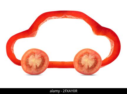 Voiture de légumes isolée sur blanc. Banque D'Images