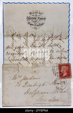 Lettre de vœux victorienne de Noël et de nouvel an envoyée en 1866 et écrite en « cross-writing » ou « cross-Hachy » pour économiser du papier et des frais d'affranchissement. Banque D'Images