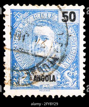 MOSCOU, RUSSIE - 23 SEPTEMBRE 2019: Timbre-poste imprimé en Angola montre le roi Carlos I, série Definitifs (Type 2), vers 1898 Banque D'Images