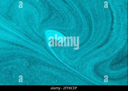 Abstrait Teal peinture tourbillonnant avec des taches Banque D'Images