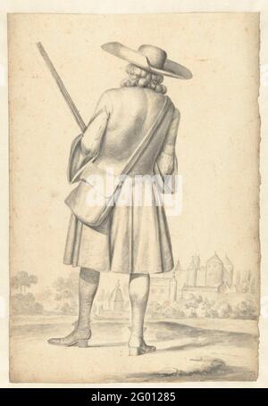 Homme debout avec fusil, vu sur le dos. Banque D'Images