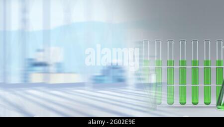 Composition des tubes à essai de liquide vert dans le rack, avec un espace de copie flou en arrière-plan Banque D'Images