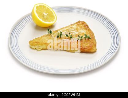 Saganaki, fromage grec frit est l'un des mezzes les plus populaires dans les tavernes grecques Banque D'Images