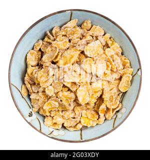 vue de dessus des cornflakes enrobés de sucre dans un bol rond isolé sur fond blanc Banque D'Images