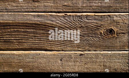 Ancien arrière-plan en bois. Ancienne clôture en bois gris, non peinte Banque D'Images