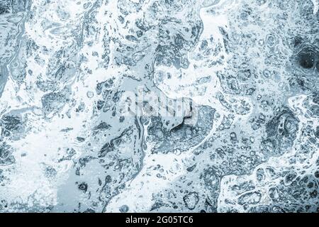 Arrière-plan abstrait peint monochrome. Peintures noir et blanc, texture d'encre liquide. Abstraction de grunge gris, peinture vintage. Motif à pois. Staine Banque D'Images