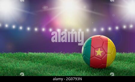 Ballon de football aux couleurs drapeau sur un fond de stade flou et lumineux. Cameroun. Image 3D Banque D'Images