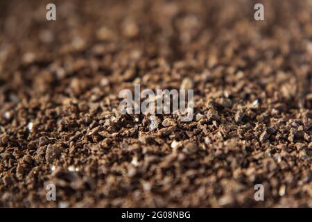 Photo macro de grains de café torréfiés moulus Banque D'Images
