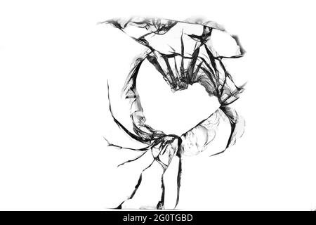 Trou fissuré sur verre cassé, texture sur fond blanc Banque D'Images