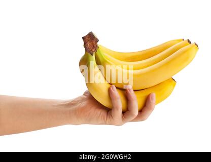 bouquet de bananes dans le chemin de la main isolé sur blanc Banque D'Images