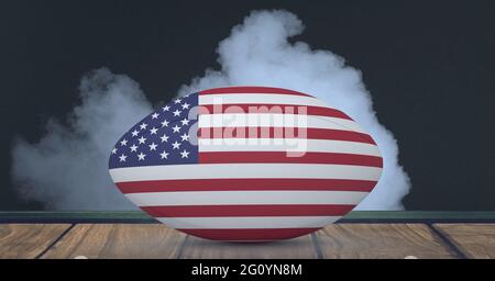 Composition du ballon de rugby du drapeau des états-unis sur fond noir avec fumée blanche Banque D'Images