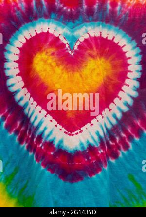 Hippie colorée coeur psychédélique amour Tie Dye Design. Banque D'Images