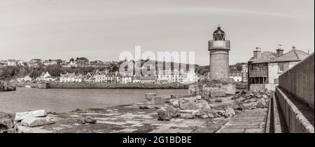 C'est un phare de la ville côtière et après le port de ferry de Portpatrick sur la péninsule de Dumfries et Galloway sur la côte ouest de l'Écosse Banque D'Images