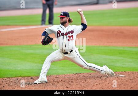 Atlanta, GA, USA. 06th June, 2021. Atlanta Braves outfielder Ehire Adrianza  walks back to the dugout during the eighth inning of a MLB game against the  Los Angeles Dodgers at Truist Park