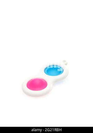 Jouets anti-stress sensoriels à bulles pop colorées, isolés sur fond blanc Banque D'Images