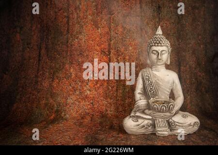 figure d'un jeune Bouddha dans un état de méditation Banque D'Images