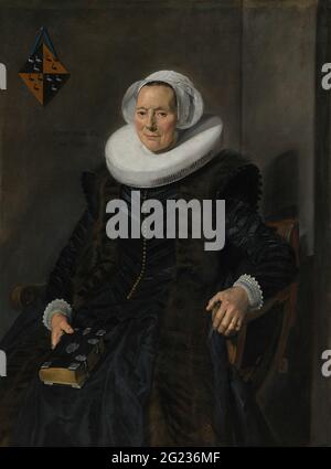 Portrait de Maritge Claesdr Vooght. Frans Hals a peint un grand nombre de superbes apparences de membres de la haute classe de Haarlem : il savait clairement comment satisfaire les exigences de ses éminents patrons. Maritge Vooght, épouse du maire Pieter Olycan, ishere représenté dans une posture traditionnelle, fièrement assis droit et regardant directement le spectateur. L'ESLA a noté son âge, 62 ans, à gauche. Son blason a été ajouté plus tard par une main différente. Banque D'Images