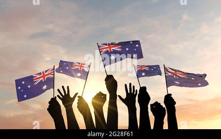 Silhouette des bras levés orgueillir d'un drapeau australien. Rendu 3D Banque D'Images