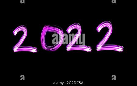Nouvelle année 2022, exposition longue lumières violettes lettering 2022, nouvelle année prochaine idée de concept photo.