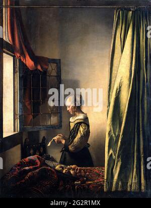 Jan Vermeer Van Delft - fille lisant une lettre par une fenêtre ouverte Banque D'Images