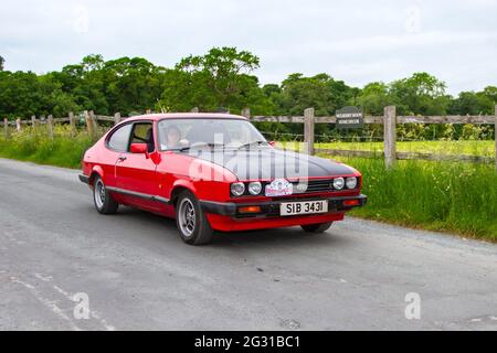 1986 80 années 80 rouge Ford Capri laser 1993cc à essence en voiture classique et vintage au salon Heskin Hall, Lancashire, Royaume-Uni Banque D'Images