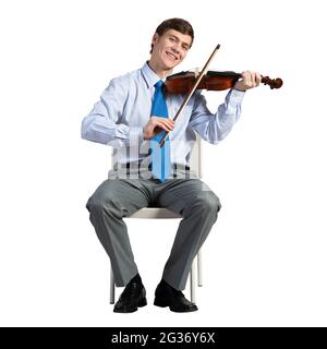 homme d'affaires sur une chaise avec violon Banque D'Images