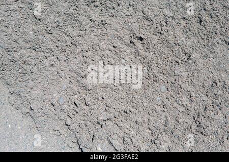 gros plan de sable gris et de cailloux, idéal pour une utilisation en arrière-plan ou en texture Banque D'Images