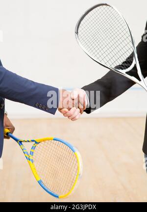 Les joueurs d'affaires Squash Banque D'Images